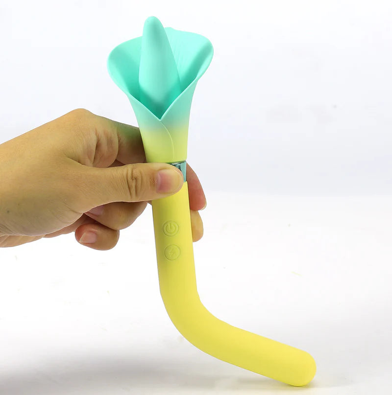 Hand holding VALA yellow flower vibrator - yellow stem and green petals