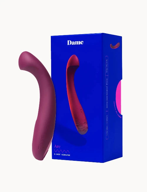 dame arc vibrator next to blue packaging