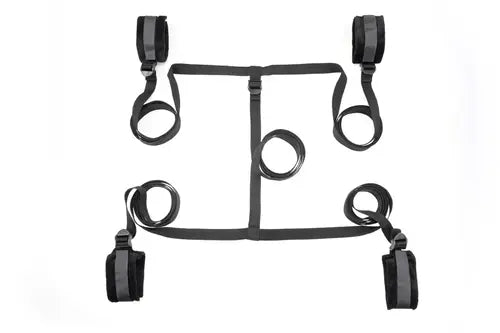Black restraint device with multiple loops on a white background