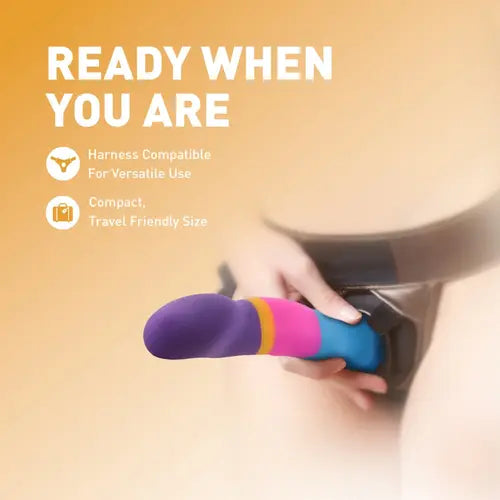 hotncold purple, gold, pink, and blue dildo in harness with words Ready When You Are