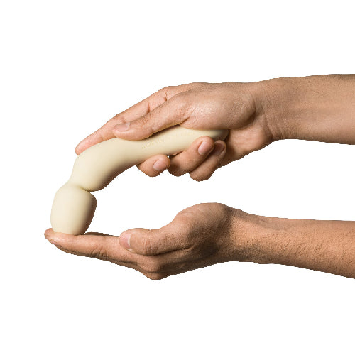 hands holding Min butter wand vibrator, showing flexible tip