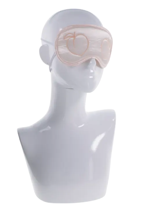 Peaches 'n CreaMe peach-colored satin blindfold with embroidered peaches on white mannequin head