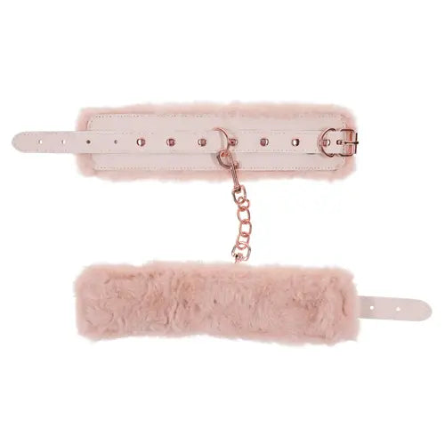 Peaches 'n CreaMe handcuffs - peach-colored fur-lined handcuffs, undone and attached by rose gold chain