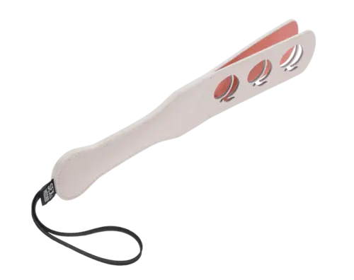 Peaches 'n CreaMe Paddle - peach colored paddle on an angle with three peach cutouts and wrist strap