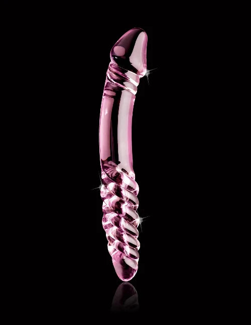 pink double sided dildo against black background