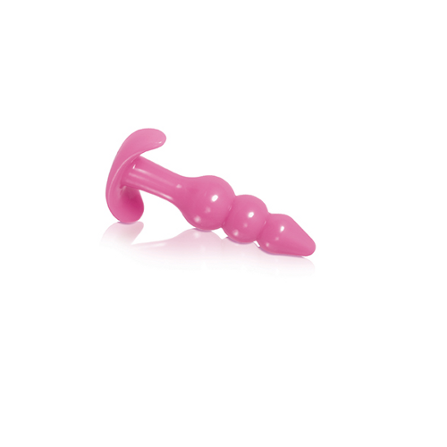 pink butt plug against white background
