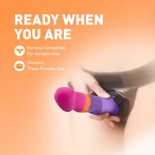 Summer Fling dildo in harness with peach background