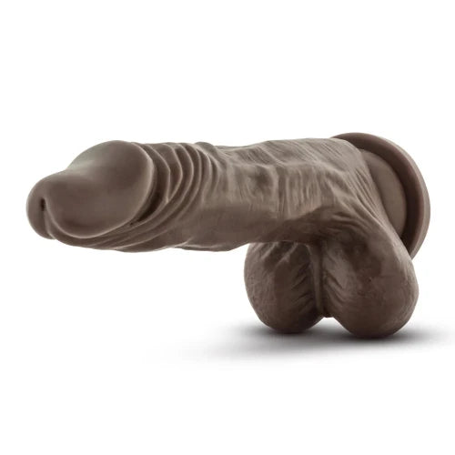 chocolate dildo against white background