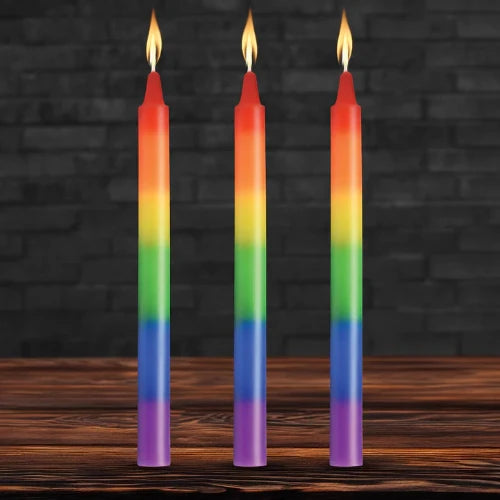 three rainbow candles
