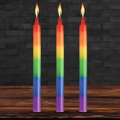three rainbow candles