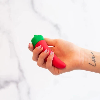 hand holding chili pepper vibrator