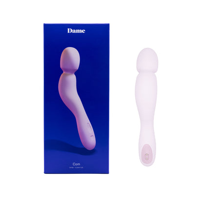 com wand vibrator next to blue package