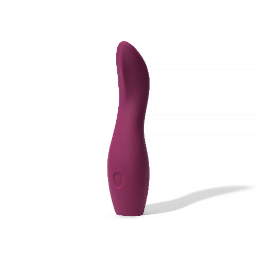 plum dame dip vibrator against white background