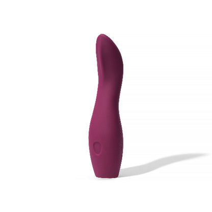 plum dame dip vibrator against white background