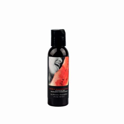 Bottle of massage lotion with a black cap on a white background
