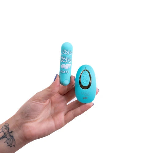 hand holding blue vibrator and Remote control against white background