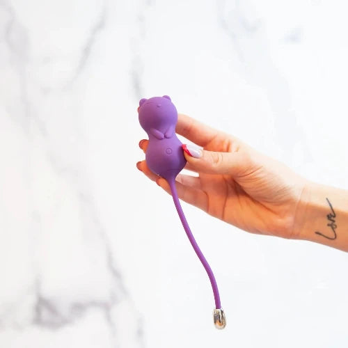 hand holding kitty cat Kegel toy