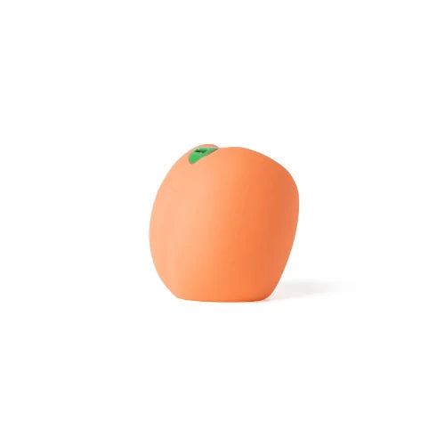 peach stroker toy side view against white background