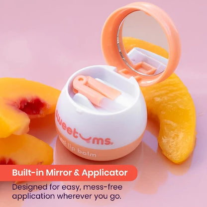 Lip balm with mirror and applicator on a pink background with peach slices.