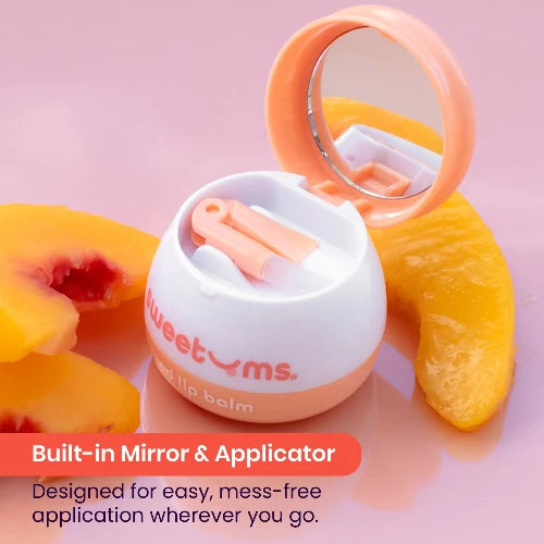 Lip balm with mirror and applicator on a pink background with peach slices.