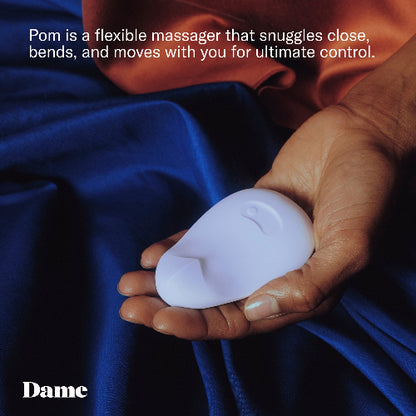 hand holding pom ice vibrator in palm