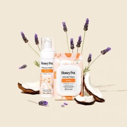 honey pot intimate wash bottle and wipes next to lavender and coconut