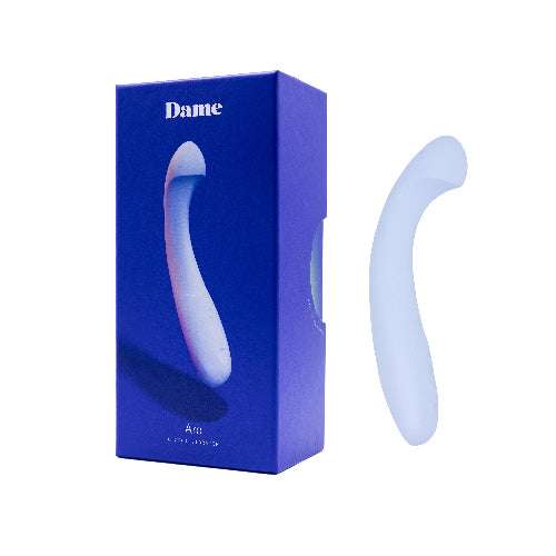 dame arc vibrator in ice color next to blue packaging