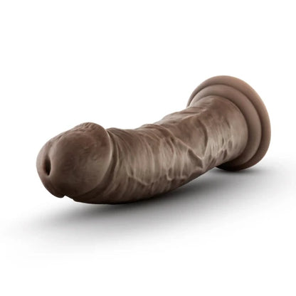 chocolate dildo against white background