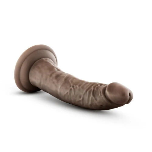 chocolate dildo against white background