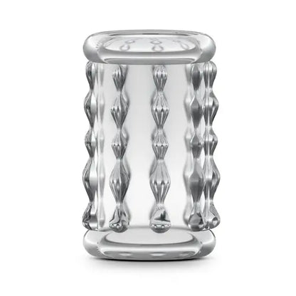 Clear Ridged Cock Sleeve against white background