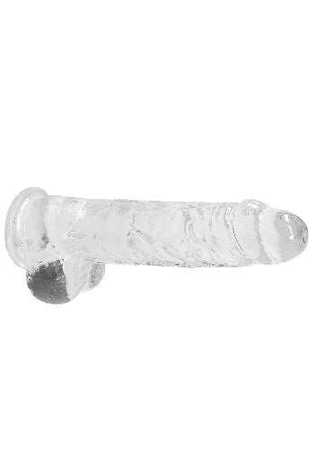 crystal clear dildo against white background