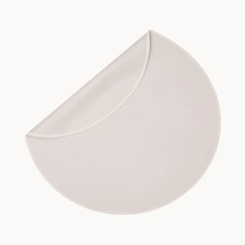 circular blanket partially folded over