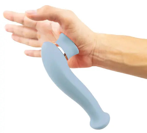 Hand demonstrating suction function of blue DESTINY clitoral suction vibrator