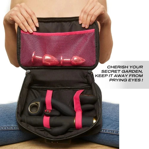 woman holding dorcel discreet box black open, showing interior with pink accents