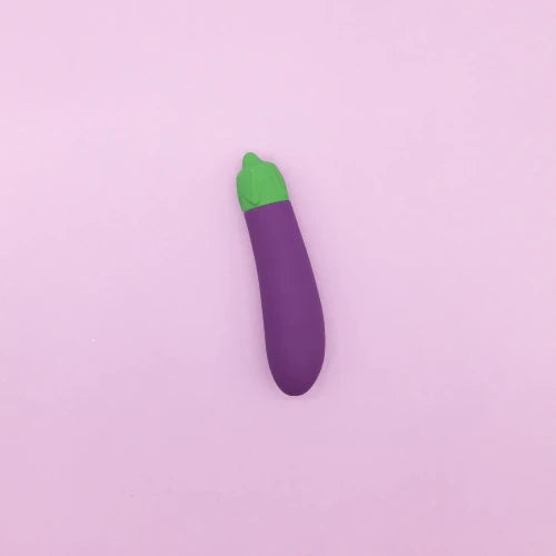 eggplant emoji against purple background