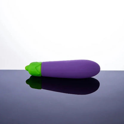 eggplant vibrator against blue and white background