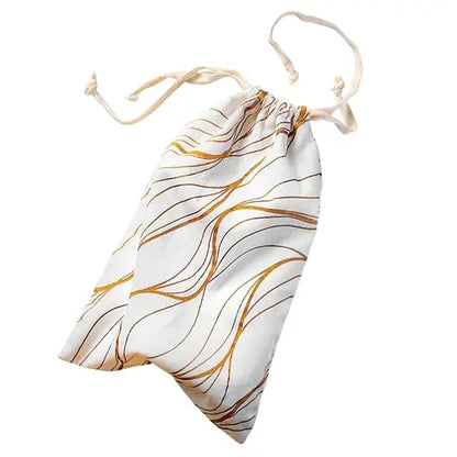 Embrace sex toy storage bag cream and gold against white background