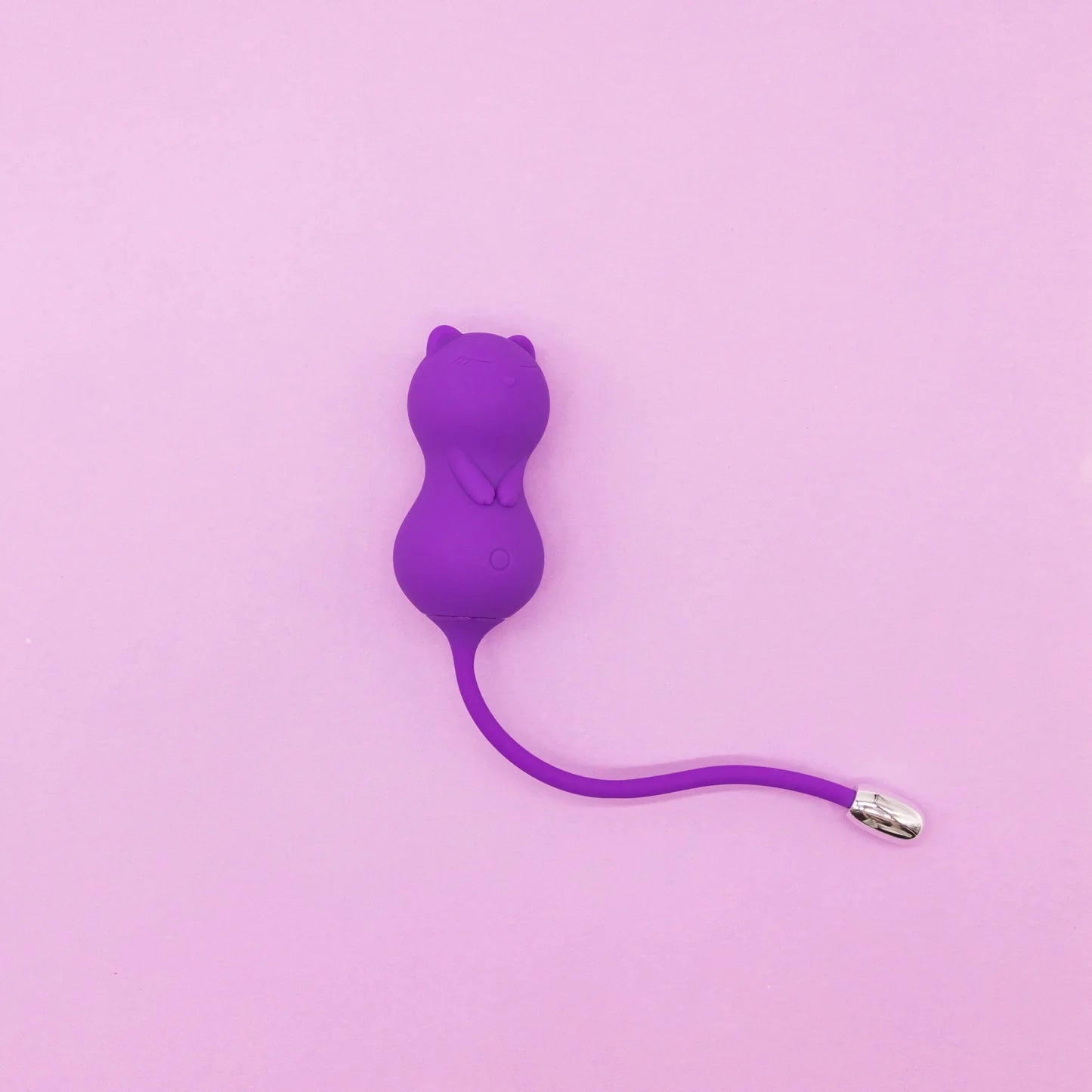 purple kegel toy on purple background