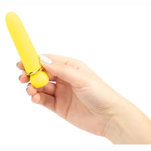 Hand holding yellow JAGUAR bullet vibrator
