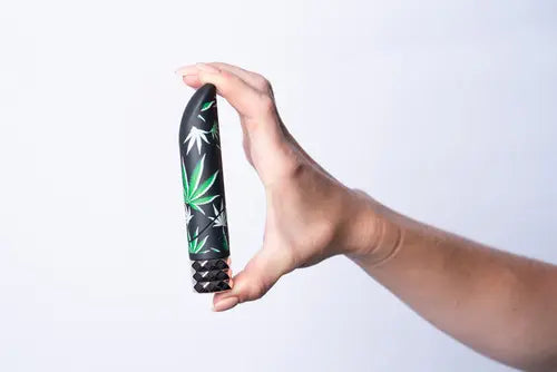 Hand holding Jane Cannabis Design Bullet Vibrator