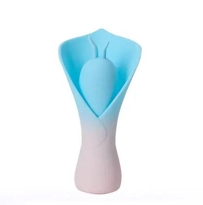 MINA blue fluttering vibrator against white background