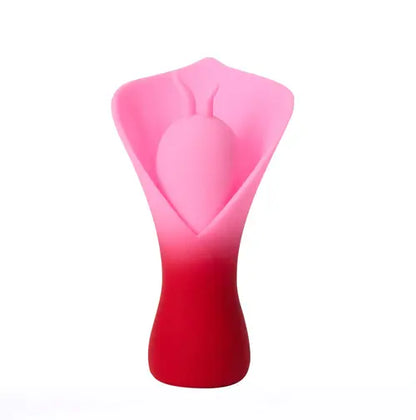 MINA red fluttering vibrator against white background