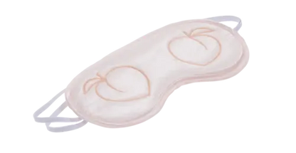 Peaches 'n CreaMe peach-colored satin blindfold with embroidered peaches, angled against transparent background