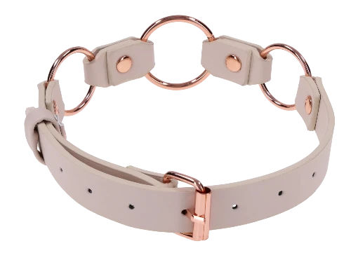 peaches n creame collar with rose gold faux leather and rose gold rings