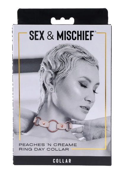 peaches n creame collar in black and white package