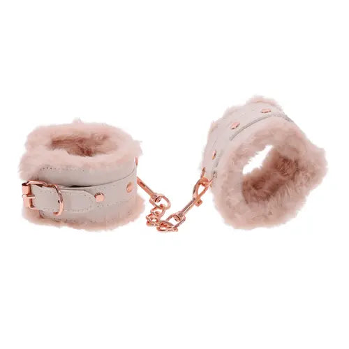 Peaches 'n CreaMe handcuffs - peach-colored fur-lined handcuffs attached by rose gold chain
