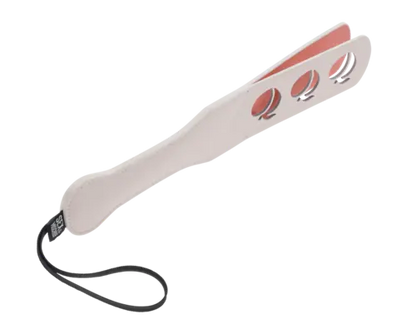 Peaches 'n CreaMe Paddle - peach colored paddle on an angle with three peach cutouts and wrist strap