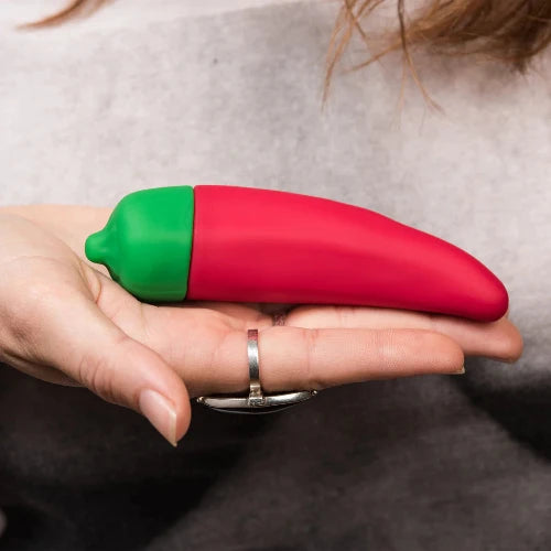 hand holding chili pepper vibrator