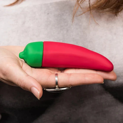 hand holding chili pepper vibrator