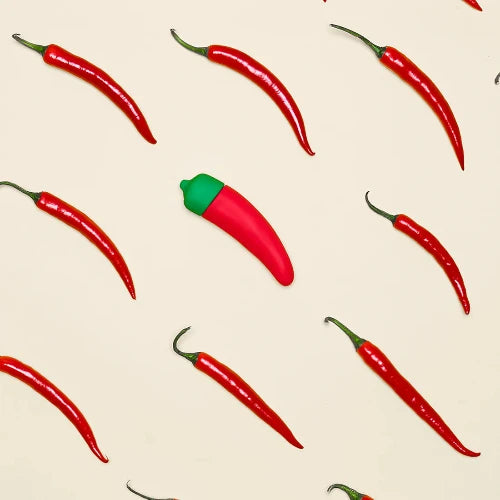 chili pepper vibrator against white background
